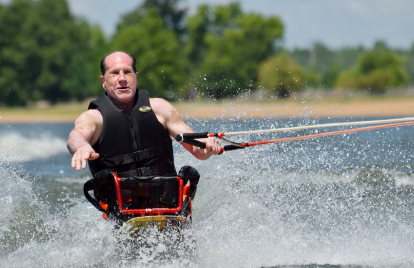 A man is water skiing.