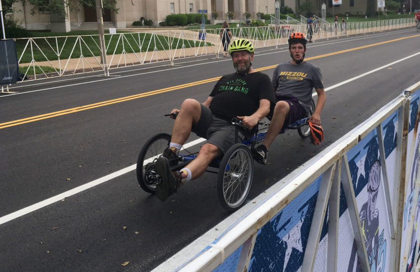 Father and son biking.