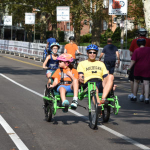 Father and child biking.